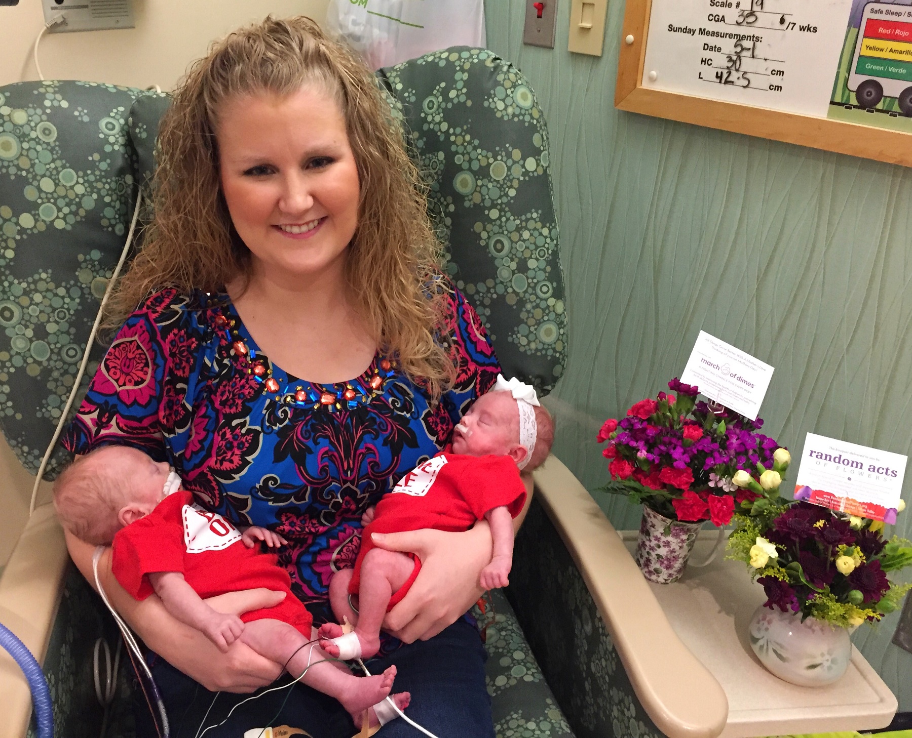 Mom holding premature twins